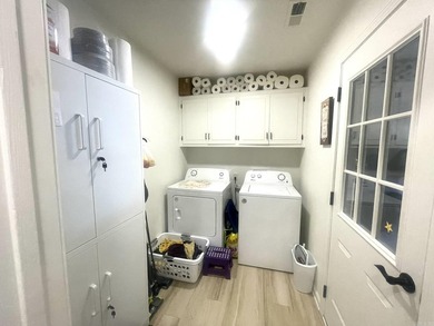 Welcome Home! A charming home tucked away in a beautiful on The Course at River Oaks in Arkansas - for sale on GolfHomes.com, golf home, golf lot