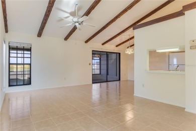 Welcome home to your lovely 2 bedroom, 2 bathroom END UNIT on Sabal Trace Golf and Country Club in Florida - for sale on GolfHomes.com, golf home, golf lot