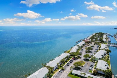 Welcome to a St. Pete, Florida waterfront home! This Waterside on St. Petersburg Country Club in Florida - for sale on GolfHomes.com, golf home, golf lot