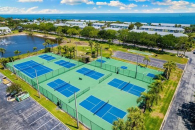 Welcome to a St. Pete, Florida waterfront home! This Waterside on St. Petersburg Country Club in Florida - for sale on GolfHomes.com, golf home, golf lot