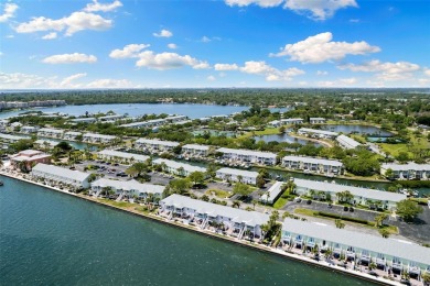 Welcome to a St. Pete, Florida waterfront home! This Waterside on St. Petersburg Country Club in Florida - for sale on GolfHomes.com, golf home, golf lot