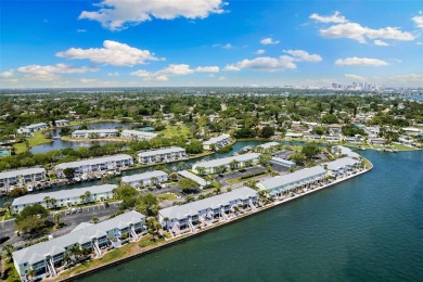 Welcome to a St. Pete, Florida waterfront home! This Waterside on St. Petersburg Country Club in Florida - for sale on GolfHomes.com, golf home, golf lot