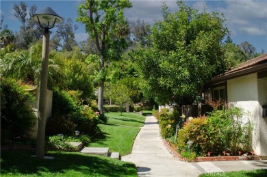 Location, Location. This Vista Valencia Townhome is conveniently on Vista Valencia Golf Course in California - for sale on GolfHomes.com, golf home, golf lot