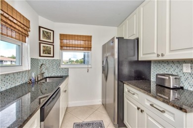 This beautifully and completely remodeled corner unit featuring on Hibiscus Golf Club in Florida - for sale on GolfHomes.com, golf home, golf lot