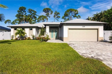Nearly new construction, set directly on the Saltleaf Golf on Raptor Bay Golf Club in Florida - for sale on GolfHomes.com, golf home, golf lot