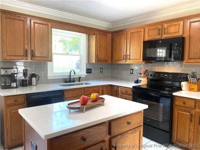 STUNNING 4 BEDROOM PLUS BONUS ROOM IN ESTABLISHED KINGS GRANT on Kings Grant Golf and Country Club in North Carolina - for sale on GolfHomes.com, golf home, golf lot