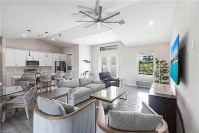 Nearly new construction, set directly on the Saltleaf Golf on Raptor Bay Golf Club in Florida - for sale on GolfHomes.com, golf home, golf lot