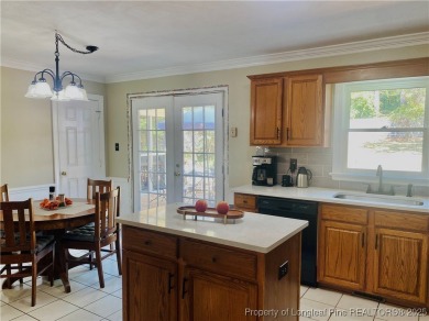 STUNNING 4 BEDROOM PLUS BONUS ROOM IN ESTABLISHED KINGS GRANT on Kings Grant Golf and Country Club in North Carolina - for sale on GolfHomes.com, golf home, golf lot