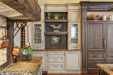 Now accepting Bitcoin. A triumph of architectural artistry on Alpharetta Athletic Club West in Georgia - for sale on GolfHomes.com, golf home, golf lot