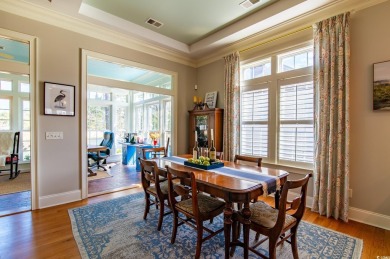 Welcome to this stunning lakefront home located in the highly on The Reserve Golf Club at Pawleys Island in South Carolina - for sale on GolfHomes.com, golf home, golf lot
