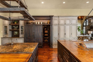 Now accepting Bitcoin. A triumph of architectural artistry on Alpharetta Athletic Club West in Georgia - for sale on GolfHomes.com, golf home, golf lot