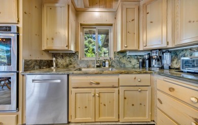 This stunning lakefront home offers panoramic views of Lake on Lake Almanor Country Club in California - for sale on GolfHomes.com, golf home, golf lot