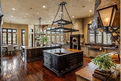 Now accepting Bitcoin. A triumph of architectural artistry on Alpharetta Athletic Club West in Georgia - for sale on GolfHomes.com, golf home, golf lot