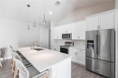 Rare opportunity in Bonita Springs: a nearly new 2023-built on Raptor Bay Golf Club in Florida - for sale on GolfHomes.com, golf home, golf lot