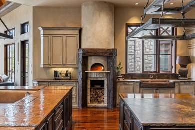 Now accepting Bitcoin. A triumph of architectural artistry on Alpharetta Athletic Club West in Georgia - for sale on GolfHomes.com, golf home, golf lot