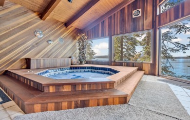 This stunning lakefront home offers panoramic views of Lake on Lake Almanor Country Club in California - for sale on GolfHomes.com, golf home, golf lot