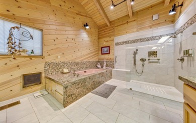 This stunning lakefront home offers panoramic views of Lake on Lake Almanor Country Club in California - for sale on GolfHomes.com, golf home, golf lot