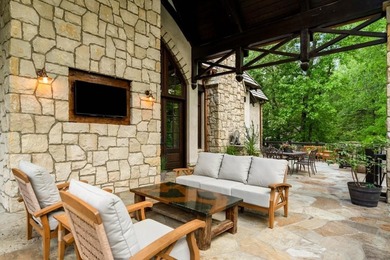 Now accepting Bitcoin. A triumph of architectural artistry on Alpharetta Athletic Club West in Georgia - for sale on GolfHomes.com, golf home, golf lot