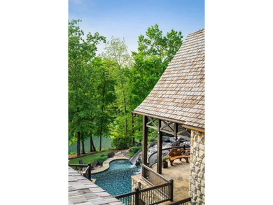 Now accepting Bitcoin. A triumph of architectural artistry on Alpharetta Athletic Club West in Georgia - for sale on GolfHomes.com, golf home, golf lot