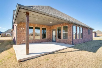 New construction and it is the perfect home for the avid golfer on Pheasant Run in Oklahoma - for sale on GolfHomes.com, golf home, golf lot