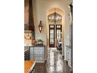 Now accepting Bitcoin. A triumph of architectural artistry on Alpharetta Athletic Club West in Georgia - for sale on GolfHomes.com, golf home, golf lot