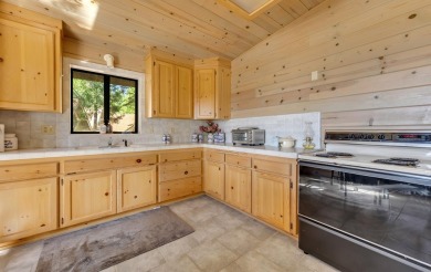 This stunning lakefront home offers panoramic views of Lake on Lake Almanor Country Club in California - for sale on GolfHomes.com, golf home, golf lot