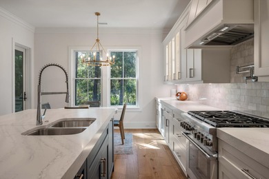 Set along a quiet lagoon with mature oaks, this newly on The Seabrook Island Club in South Carolina - for sale on GolfHomes.com, golf home, golf lot