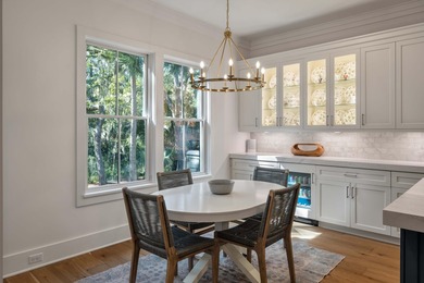 Set along a quiet lagoon with mature oaks, this newly on The Seabrook Island Club in South Carolina - for sale on GolfHomes.com, golf home, golf lot