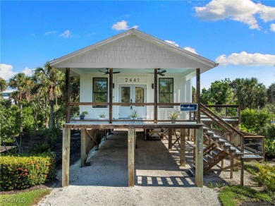 Experience coastal living at its finest in this stunning on The Sanctuary Golf Club in Florida - for sale on GolfHomes.com, golf home, golf lot