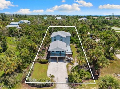 Experience coastal living at its finest in this stunning on The Sanctuary Golf Club in Florida - for sale on GolfHomes.com, golf home, golf lot