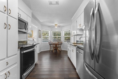 This home checks all the boxes! Enjoy peace of mind knowing the on Gulf Hills Golf Club in Mississippi - for sale on GolfHomes.com, golf home, golf lot