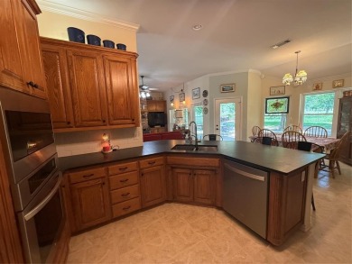 Located in the highly sought-after gated community of Pecan on Pecan Plantation Country Club in Texas - for sale on GolfHomes.com, golf home, golf lot