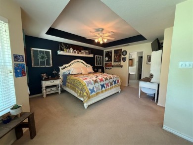 Located in the highly sought-after gated community of Pecan on Pecan Plantation Country Club in Texas - for sale on GolfHomes.com, golf home, golf lot