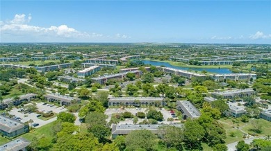 Welcome to 2614 Nassau Bnd #A1in Coconut Creek. This is a on Wynmoor Golf Course in Florida - for sale on GolfHomes.com, golf home, golf lot