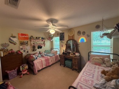 Located in the highly sought-after gated community of Pecan on Pecan Plantation Country Club in Texas - for sale on GolfHomes.com, golf home, golf lot