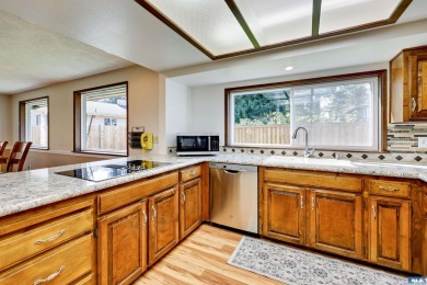 Charming 3-Bedroom Home with Fireplace, Hot Tub  Privacy Fence! on SunLand Golf and Country Club in Washington - for sale on GolfHomes.com, golf home, golf lot