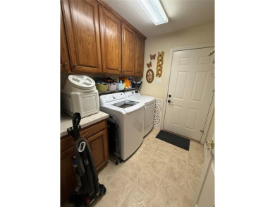 Located in the highly sought-after gated community of Pecan on Pecan Plantation Country Club in Texas - for sale on GolfHomes.com, golf home, golf lot