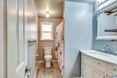 Charming 3-Bedroom Home with Fireplace, Hot Tub  Privacy Fence! on SunLand Golf and Country Club in Washington - for sale on GolfHomes.com, golf home, golf lot