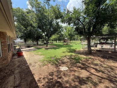 Located in the highly sought-after gated community of Pecan on Pecan Plantation Country Club in Texas - for sale on GolfHomes.com, golf home, golf lot