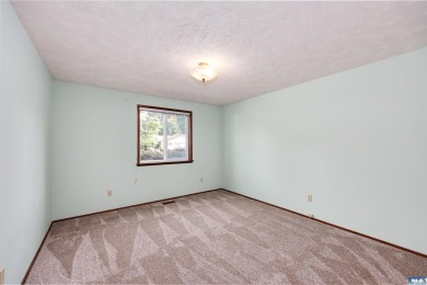 Charming 3-Bedroom Home with Fireplace, Hot Tub  Privacy Fence! on SunLand Golf and Country Club in Washington - for sale on GolfHomes.com, golf home, golf lot