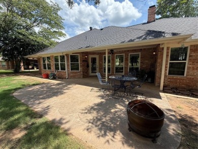 Located in the highly sought-after gated community of Pecan on Pecan Plantation Country Club in Texas - for sale on GolfHomes.com, golf home, golf lot
