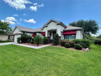 Welcome to this beautifully maintained Granville model located on Eagle Ridge At Spruce Creek Country Club in Florida - for sale on GolfHomes.com, golf home, golf lot
