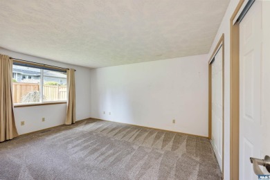 Charming 3-Bedroom Home with Fireplace, Hot Tub  Privacy Fence! on SunLand Golf and Country Club in Washington - for sale on GolfHomes.com, golf home, golf lot