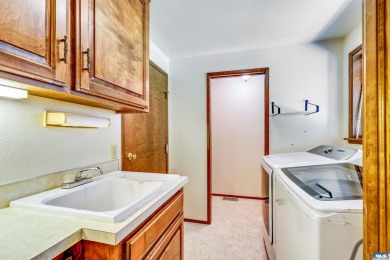 Charming 3-Bedroom Home with Fireplace, Hot Tub  Privacy Fence! on SunLand Golf and Country Club in Washington - for sale on GolfHomes.com, golf home, golf lot