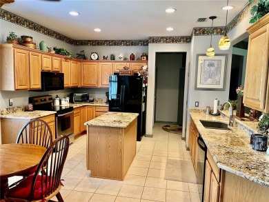 Welcome to this beautifully maintained Granville model located on Eagle Ridge At Spruce Creek Country Club in Florida - for sale on GolfHomes.com, golf home, golf lot