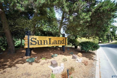 Charming 3-Bedroom Home with Fireplace, Hot Tub  Privacy Fence! on SunLand Golf and Country Club in Washington - for sale on GolfHomes.com, golf home, golf lot