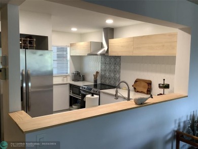 Escape to this stunning 2bedroom, 2bathroom apartment, boasting on Pine Island Ridge Country Club in Florida - for sale on GolfHomes.com, golf home, golf lot