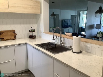 Escape to this stunning 2bedroom, 2bathroom apartment, boasting on Pine Island Ridge Country Club in Florida - for sale on GolfHomes.com, golf home, golf lot