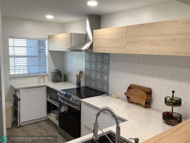 Escape to this stunning 2bedroom, 2bathroom apartment, boasting on Pine Island Ridge Country Club in Florida - for sale on GolfHomes.com, golf home, golf lot