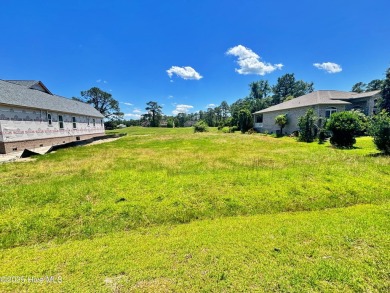 Stunning Waterview Lot Overlooking Scenic Parkland. Discover the on Harbour Point Golf Club in North Carolina - for sale on GolfHomes.com, golf home, golf lot